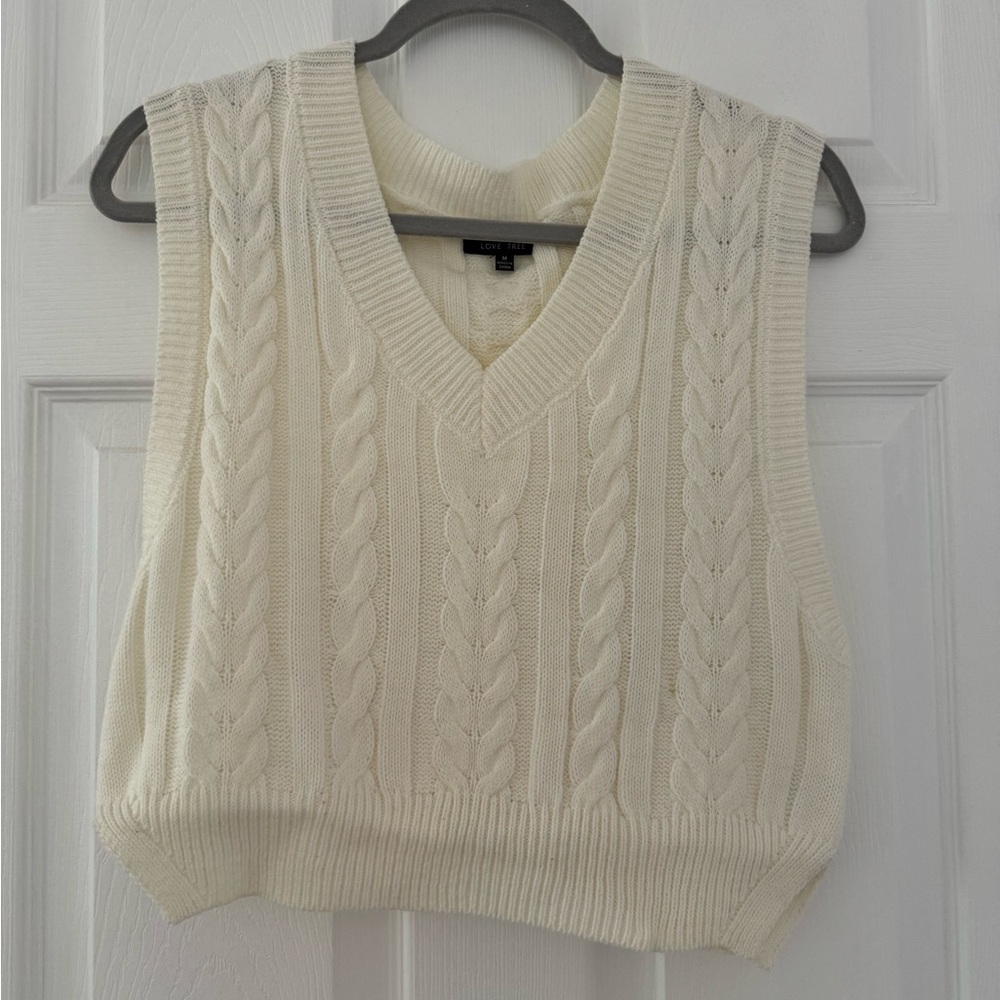 White sweater vest